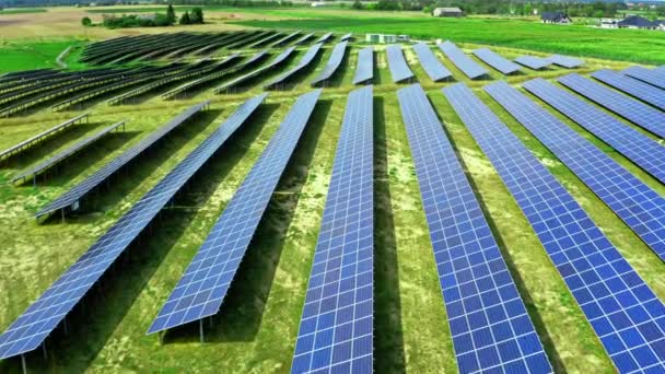Solar Panels on field in summer Poland, aerial view - Materiał filmowy, wideo
