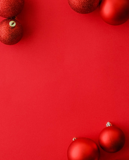 Christmas baubles on red flatlay backdrop, luxury winter holiday - Photo, image