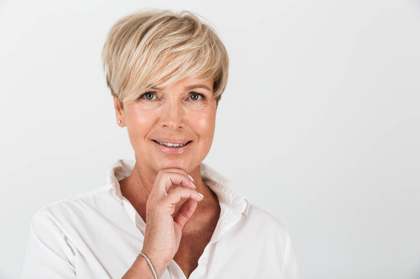 Portrait closeup of joyous adult woman with short blond hair smi - Photo, image