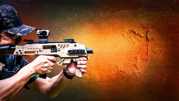 Male aim 9mm pistol gun with conversion kit to carbine and shoot - 写真・画像