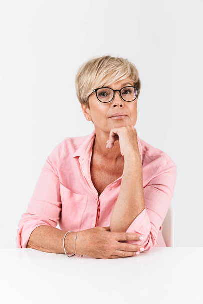 Portrait closeup of mature middle-aged woman with short blond ha - Fotoğraf, Görsel