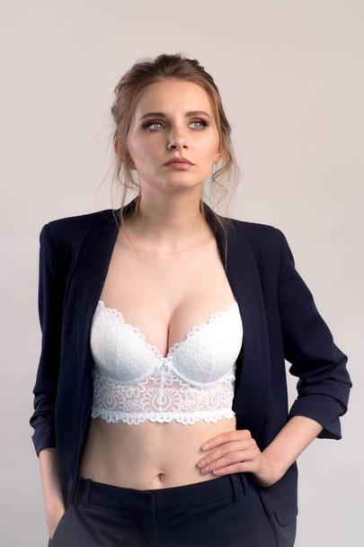 Portrait of cheerful sexy business woman in white bra. View of a - Foto, Bild