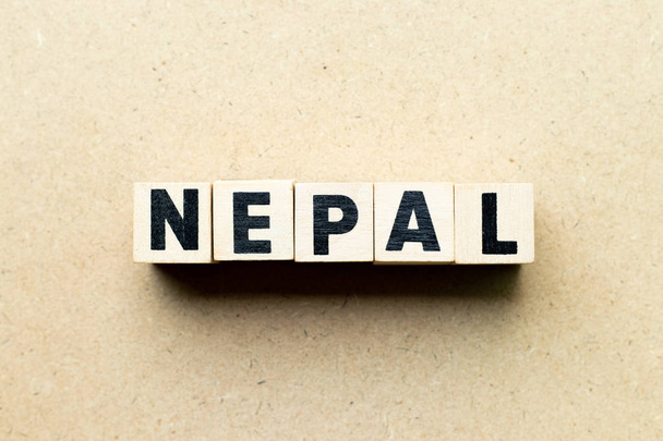 Buchstabenblock in Wort Nepal auf Holz Hintergrund - Foto, Bild