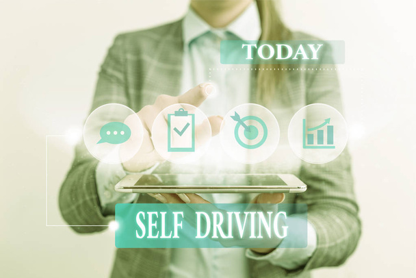 Word writing text Self Driving. Business concept for Autonomous vehicle Ability to navigate without huanalysis input Female human wear formal work suit presenting presentation use smart device. - Photo, Image