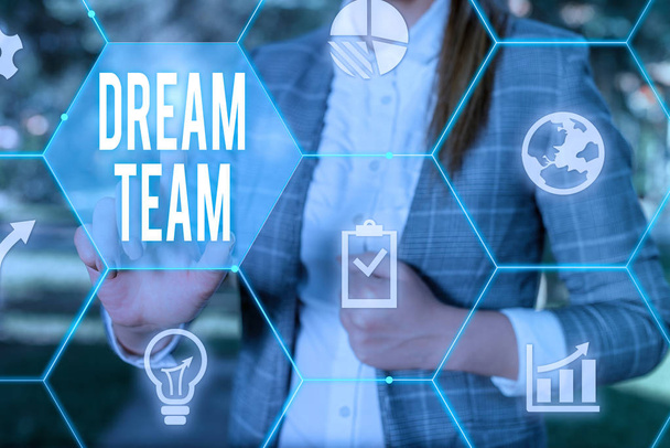 Conceptual hand writing showing Dream Team. Business photo text Prefered unit or group that make the best out of a demonstrating Female human wear formal work suit presenting smart device. - Photo, Image