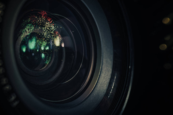 Beautiful camera aperture lens with multi colored shine glass reflection. Macro view. - Photo, Image