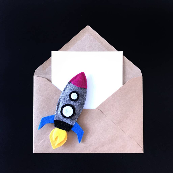 Blank Card and Toy Rocket Black Background Mockup - Photo, Image