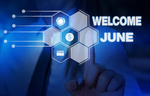 Word writing text Welcome June. Business concept for Calendar Sixth Month Second Quarter Thirty days Greetings Woman wear formal work suit presenting presentation using smart device. - Photo, Image