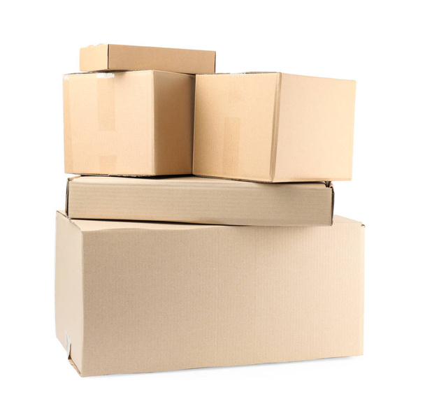 Pile of cardboard boxes on white background - 写真・画像