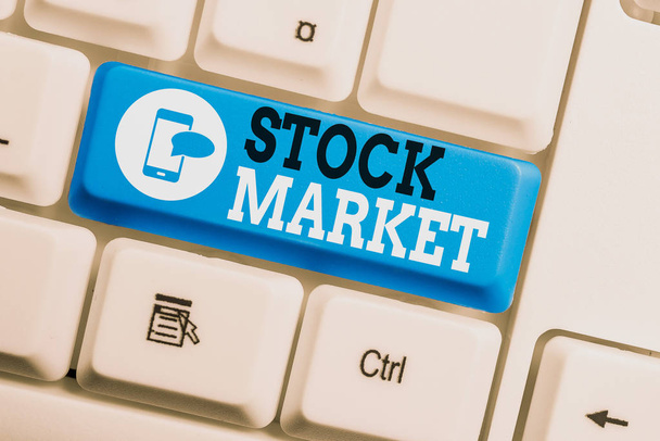 Conceptual hand writing showing Stock Market. Business photo text Particular market where stocks and bonds are traded or exhange Keyboard with note paper on white background key copy space. - Foto, Bild