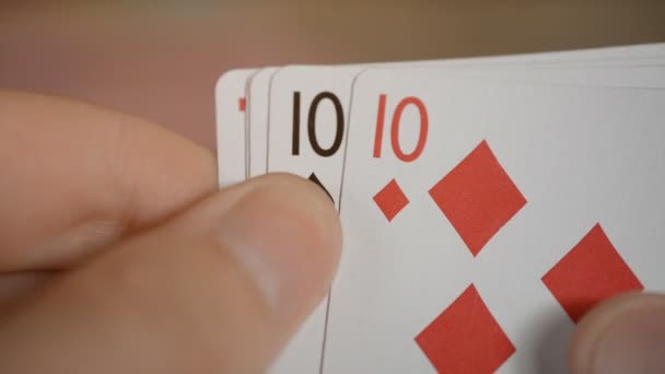 playing cards poker hands four ten - Imágenes, Vídeo