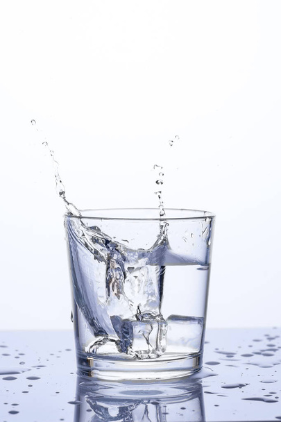 Clear water with ice in a glass - Zdjęcie, obraz