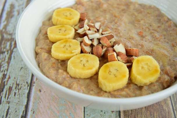 Banana almond vanilla oat porridge - Photo, Image
