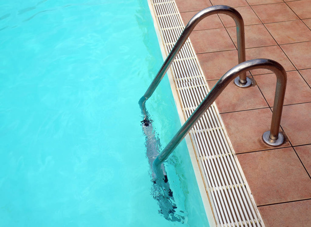 stepladder of a clear swimming pool without people - Photo, Image