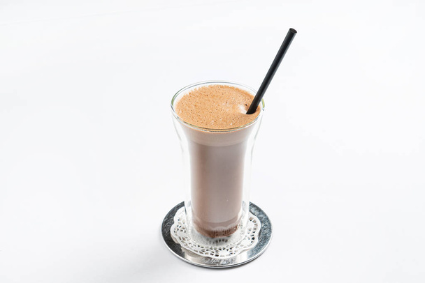 hot chocolate with cinnamon on the white background - Фото, зображення
