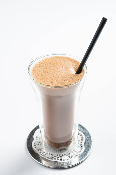 hot chocolate with cinnamon on the white background - Photo, Image