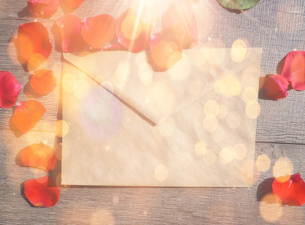red roses blurred, with envelope. the concept of the gift of romance - Photo, Image