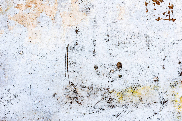 Metal texture with scratches and cracks which can be used as a background - Foto, imagen