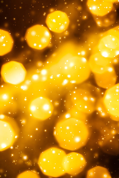 Glamorous gold shiny glow and glitter, luxury holiday background - Photo, Image