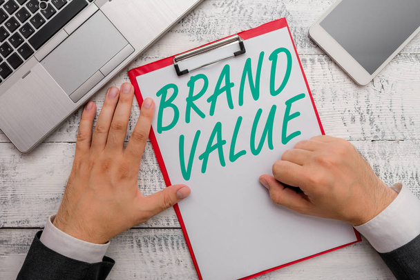 Käsitteellinen käsin kirjoittaminen osoittaa Brand Value. Business valokuva teksti yritys tuottaa tuotteesta tunnistettavissa sen nimet
. - Valokuva, kuva