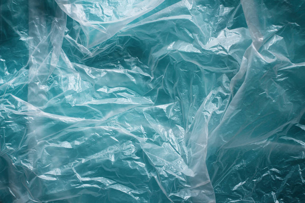 Clear plastic bag texture background. Waste recycling concept. Crumpled polyethylene and cellophane. - Foto, immagini