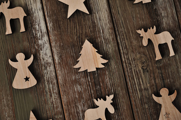 Decorative toys on wooden background. Christmas concept. - Photo, Image