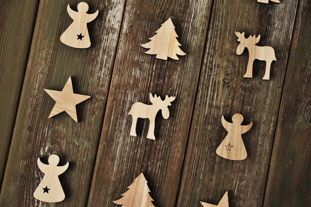 Decorative toys on wooden background. Christmas concept. - Photo, Image