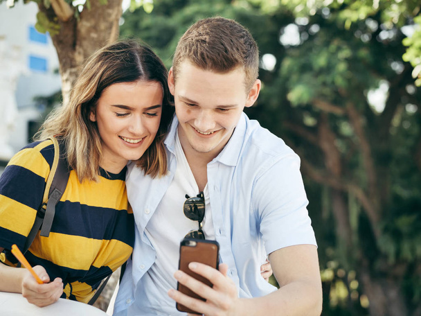 Happy couple selfie photo together by smartphone. - Valokuva, kuva
