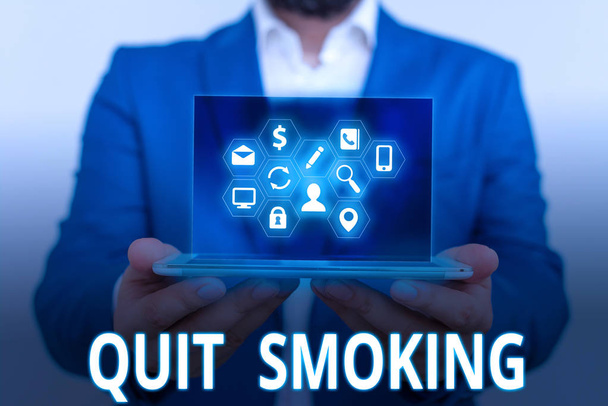 Conceptual hand writing showing Quit Smoking. Business photo text Discontinuing or stopping the use of tobacco addiction. - Photo, Image