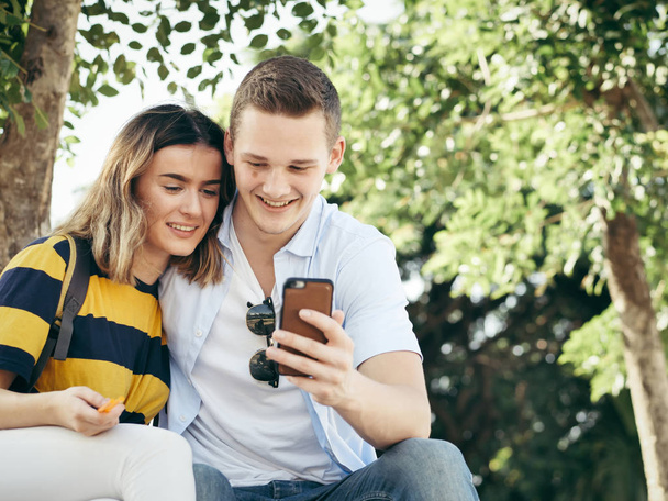 Happy couple selfie photo together by smartphone. - Photo, Image