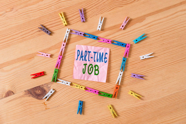 Text sign showing Part Time Job. Conceptual photo Weekender Freelance Casual OJT Neophyte Stint Seasonal Colored clothespin papers empty reminder wooden floor background office. - Photo, Image
