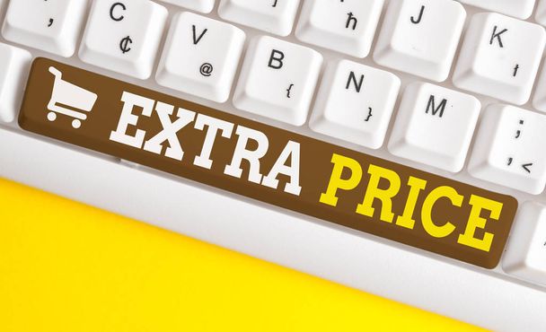Word writing text Extra Price. Business concept for extra price definition beyond the ordinary large degree White pc keyboard with empty note paper above white background key copy space. - Photo, Image