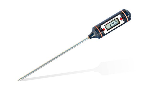 Digitale thermometer geïsoleerd op witte achtergrond - Foto, afbeelding