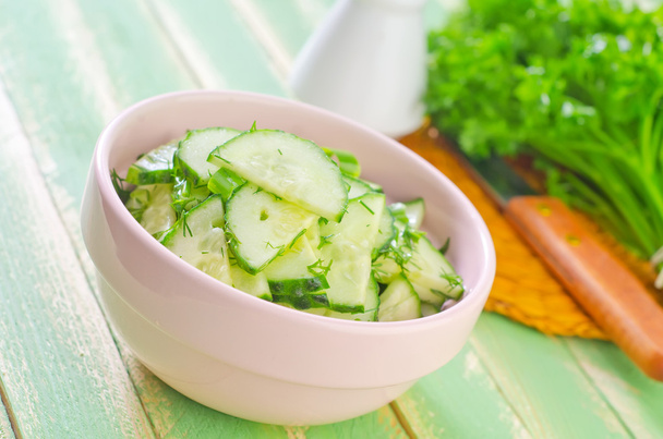 Salad with cucumbers - Фото, изображение
