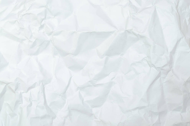 Witte verfrommeld papier textuur achtergrond. gevouwen papier. - Foto, afbeelding