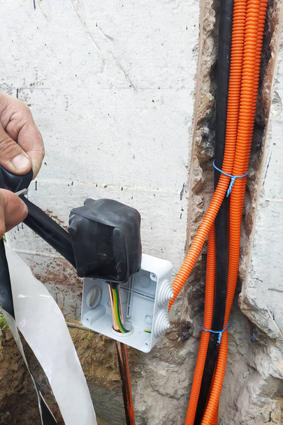 Installation of electrical grounding near the house. - Photo, Image