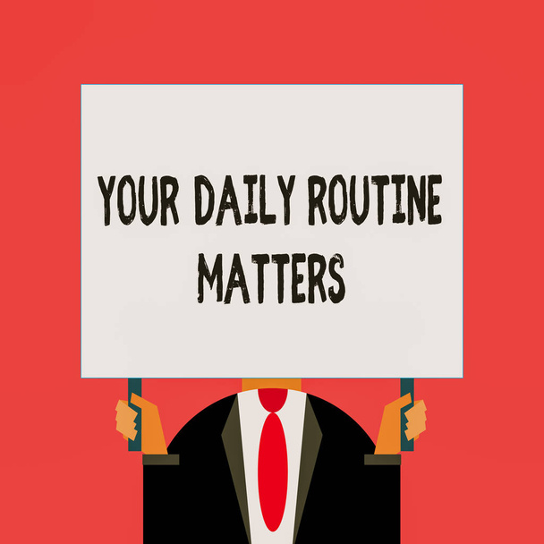 Word writing text Your Daily Routine Matters. Business concept for practice of regularly doing things in fixed order Just man chest dressed dark suit tie no face holding blank big rectangle. - Photo, Image