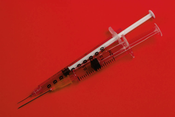 An insulin syringe with a marking, drugs on a plain background. copy space - Photo, Image