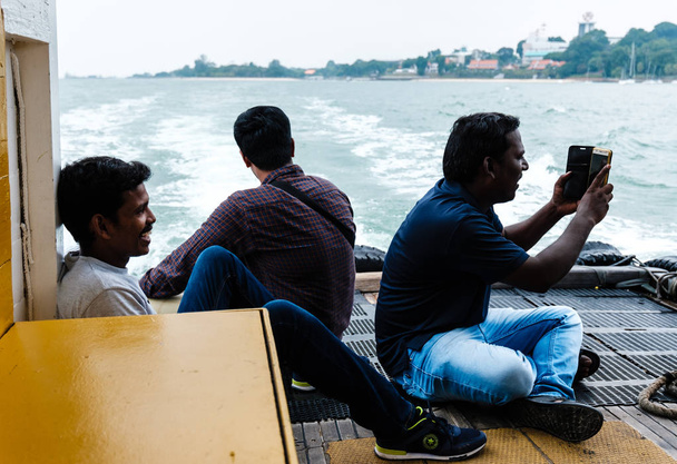 Singapore-09 AUG 2019:indian man on the Ferry go to Ubin island - Foto, Imagem