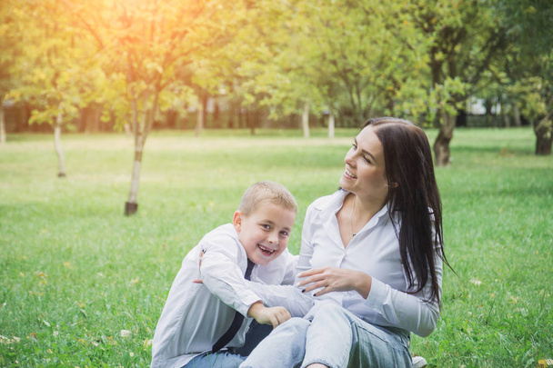 Spring, autumn or summer portrait of mother and son on Mothers Day - Foto, Imagen