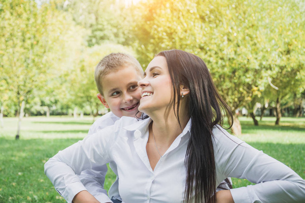 happy family concept, mom and her son outdoors - Valokuva, kuva