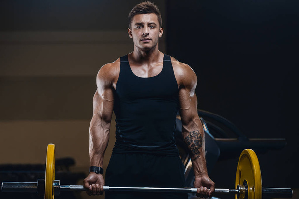 Handsome strong athletic men pumping up biceps muscles workout f - Фото, зображення