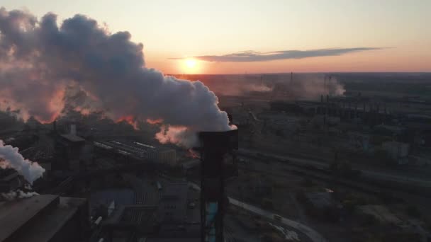 Aerial view. High chimney pipe with grey smoke. Concept of environmental pollution, climate change. - Footage, Video