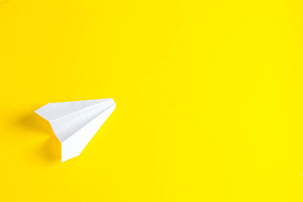 paper airplane-a symbol of easy but short-lived flight  - Zdjęcie, obraz