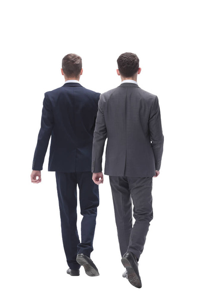 rear view. two businessmen confidently stepping forward - Φωτογραφία, εικόνα