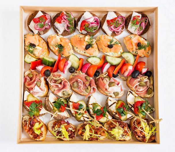 Christmas appetizers in the box, close up - Foto, Imagen
