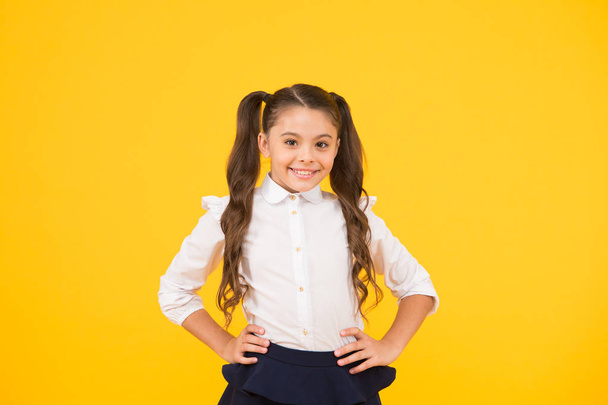 Successful graduation. Happy childrens day. Positive vibes. School life concept. Celebrate knowledge day. Student little kid. Girl pupil on yellow background. Back to school. Emotional school girl - Foto, Imagem