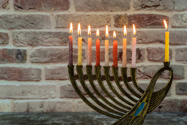 Jewish holiday Hanukkah with menorah traditional candelabra and Burning candles - Photo, Image