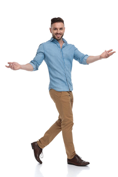 casual man walking and greeting happy - Photo, Image