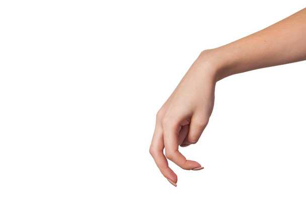 A Female hand is showing the walking fingers isolated on white - Valokuva, kuva